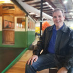 Jeremy Ellis in front of tram at launchpad